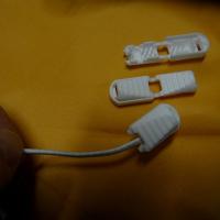 Arret plastique blanc pour cordon survetement 2