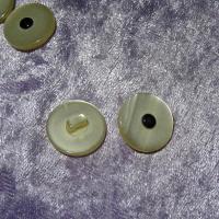 Bouton de bottines creme nacre centre noir 18 mm