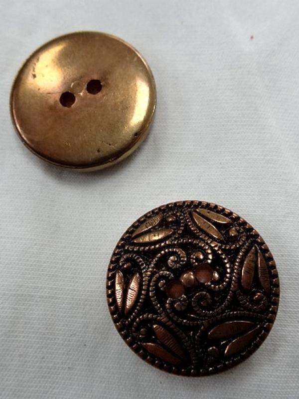 Bouton metal mordore volutes 1 