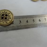 Bouton vieil or motif soleil 22 mm 2