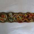 Broderie orange et kaki sur organza noir 01
