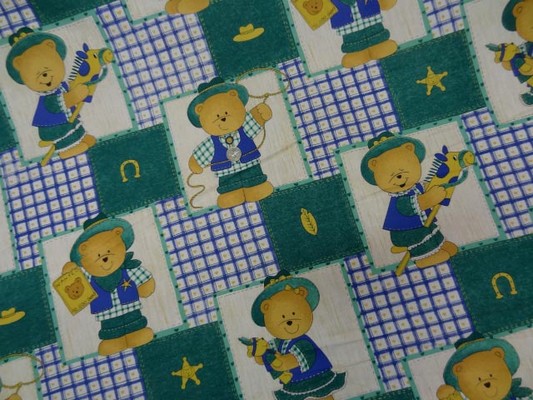 Coton imprimé ourson shérif blanc bleu vert