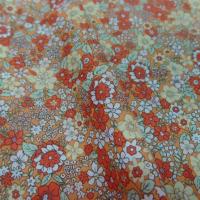 coton imprimé petite fleurs ton orange