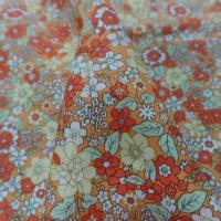 coton imprimé petite fleurs ton orange