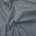 Coton noir fin motif pois en geometrie blanc 1