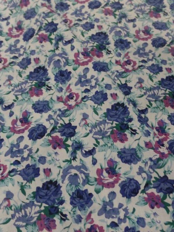 Coton popeline blanche imprimee petite fleurs bleu