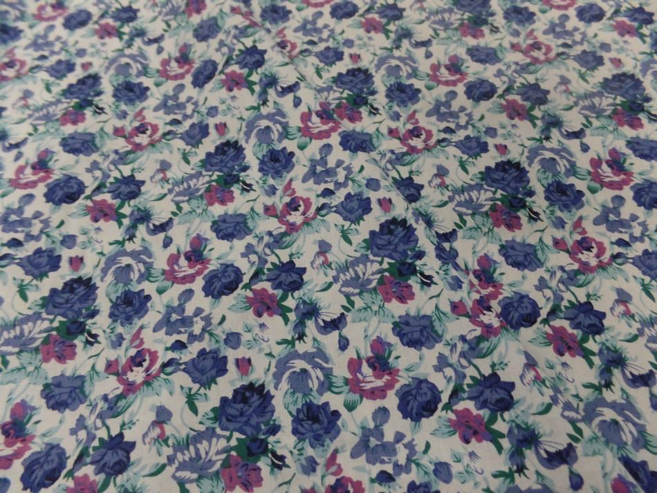 Coton popeline blanche imprimee petite fleurs bleu
