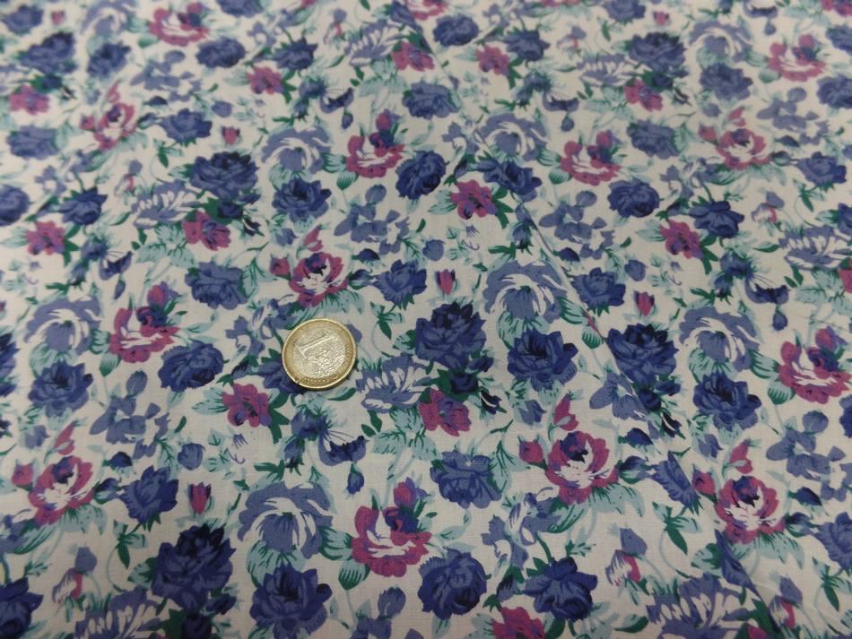Coton popeline blanche imprimée petite fleurs bleu par 50 Cm