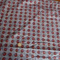 Cotonnade fond blanc motif africain rouge et bleu 01