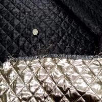 Coupon de doublure matelasse double face dore noir 2 5m0