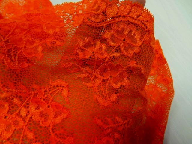Dentelle fine extensible orange corail