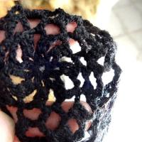 Dentelle tricotee fleurs noires en laine