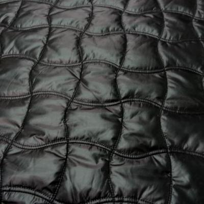 Doublure matelasse noire double polaire