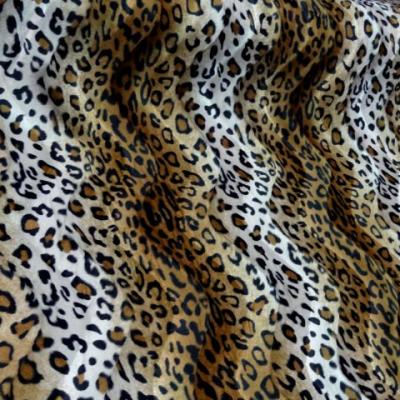 Fausse fourrure a poil ras marron et blanc imprime leopard2