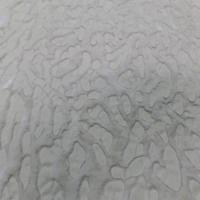 fausse fourrure beige ton sur ton façonné léopard