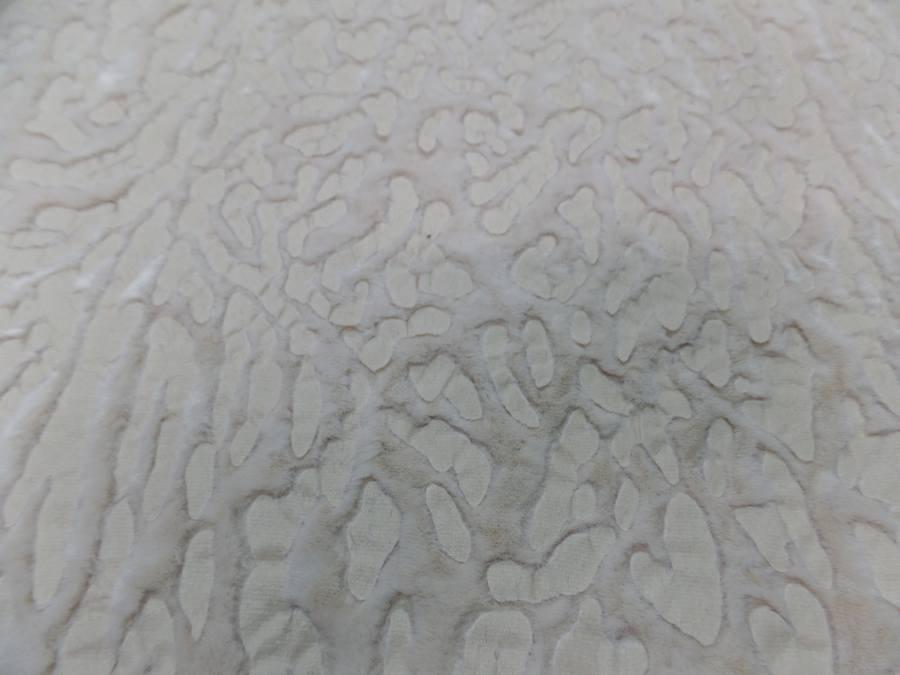 fausse fourrure beige ton sur ton façonné léopard