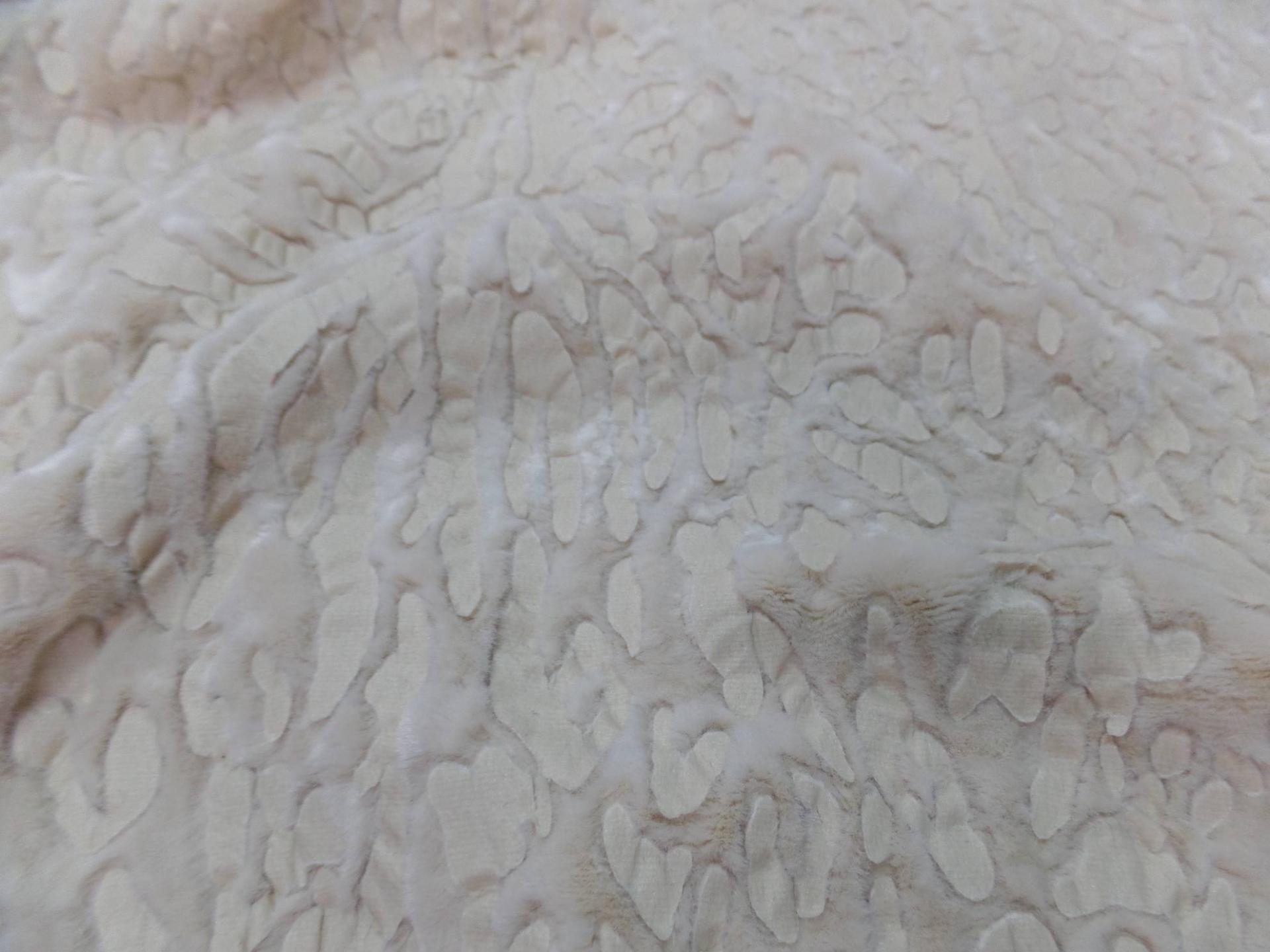 Fausse fourrure beige ton sur ton faconne leopard0