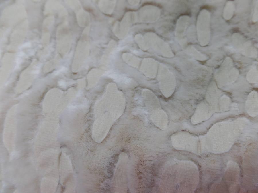 fausse fourrure beige ton sur ton façonné léopard