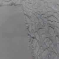 tissu fausse fourrure beige ton sur ton façonné léopard