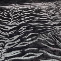 fausse fourrure noire ton sur façonné zèbre