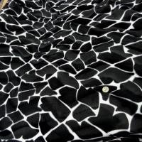 Fausse fourrure poil ras noir blanc girafe 1