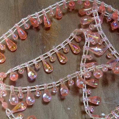 Fil de perles en goutte rose transparent 1 