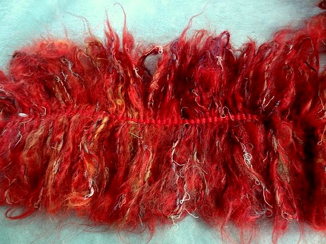Frange double en laine bouclee rouge chine 1