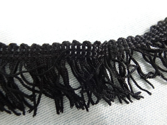 Frange en polyester noire