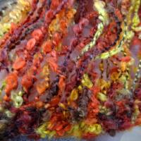 Frange laine fine bouclee teintes safran curcuma 3 