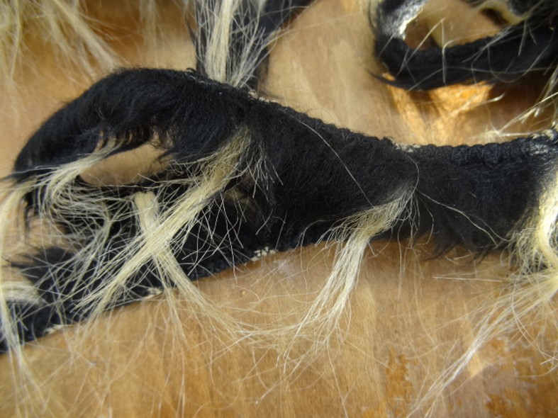 Galon cruella noir et beige fausse fourrure