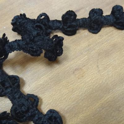 Galon elastique velours chenille noir pompons 