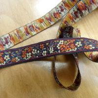 Galon fleuri fond noir prune et orange 2