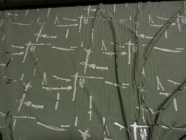 Jersey coton melange kaki motif dechirure sur fine resille 2