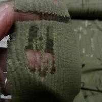 Jersey coton melange kaki motif dechirure sur fine resille 4