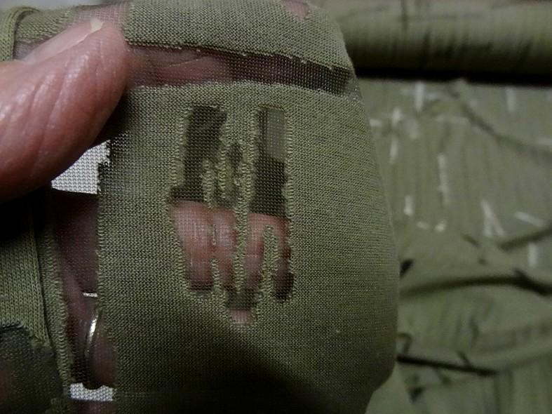 Jersey coton melange kaki motif dechirure sur fine resille 4