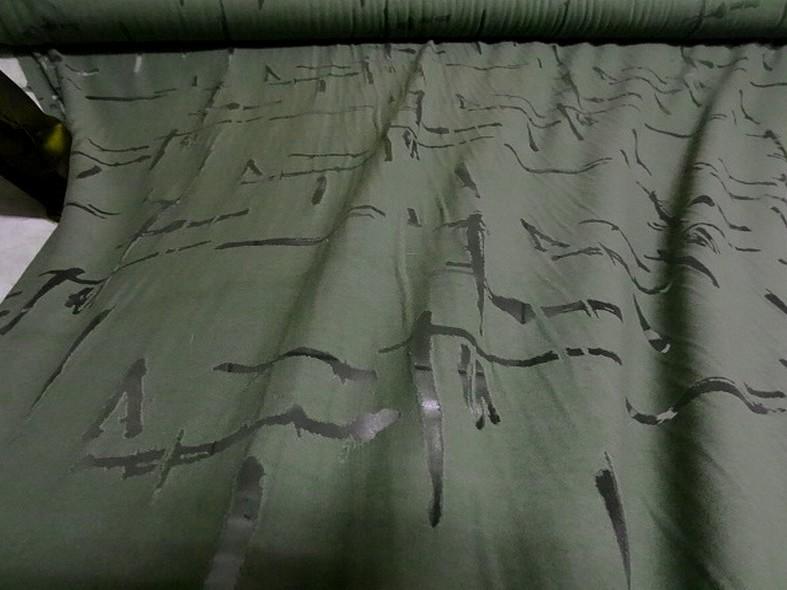 Jersey coton melange kaki motif dechirure sur fine resille 6