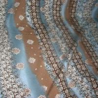 Jersey coton motif frise et fleurs noisette celadon 1