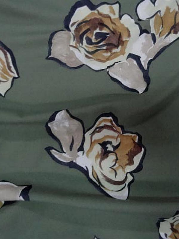 Jersey lycra vert asperge motif fleurs decoupees 3