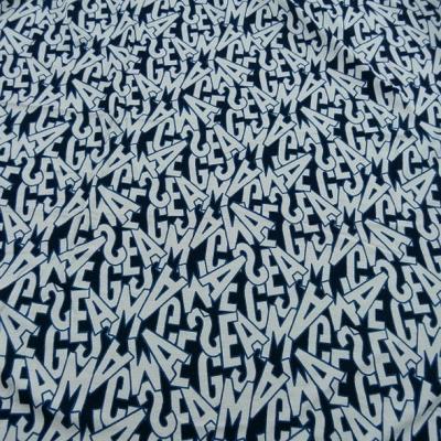 tissu Jersey viscose motif lettrage majuscule bleu blanc