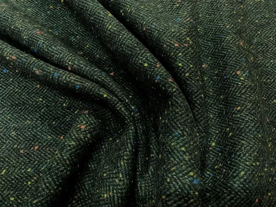 Lainage tweed vert kaki et noir chine a chevrons