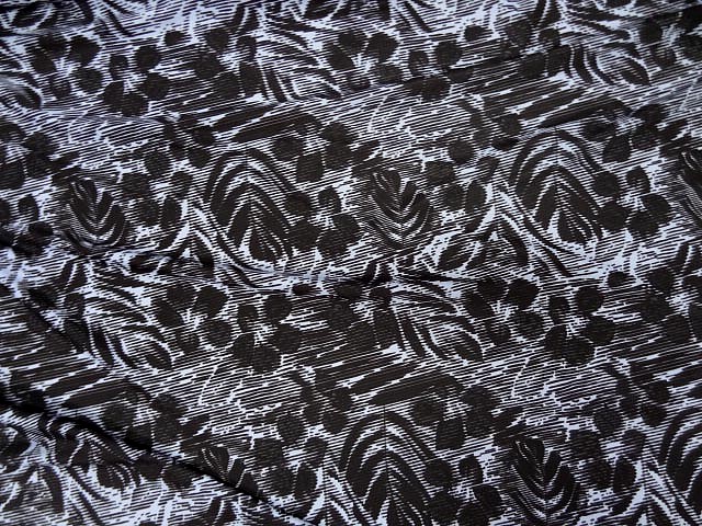 Lycra bichromie feuilles de palmiers