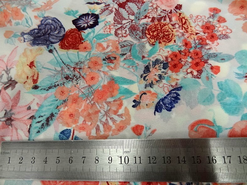 Lycra fin blanc fleuri teintes saumon bleu 2