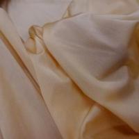 Lycra fin satine teinte pêche 1
