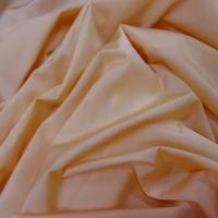 Lycra fin satine teinte pêche 2