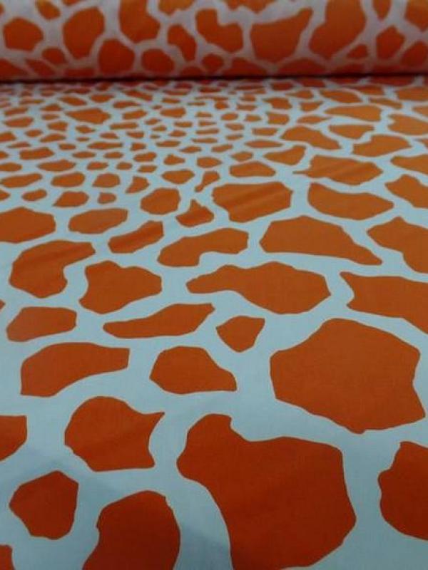 Lycra imprime taches de girafe fond blanc motif orange et jus d orange 1 