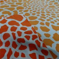 Lycra imprime taches de girafe fond blanc motif orange et jus d orange 2 
