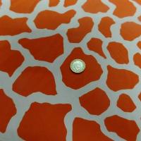 Lycra imprime taches de girafe fond blanc motif orange et jus d orange 3 