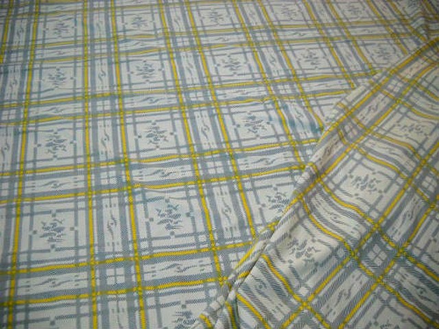 Lycra jaune et gris a carreaux paddle