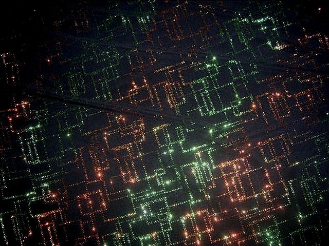 Lycra paillettes matrice orange-vert