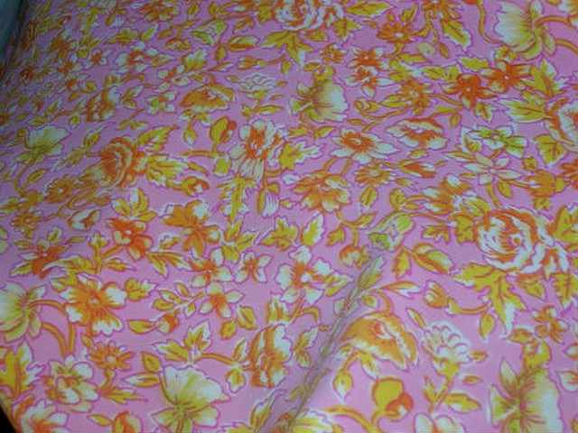 Lycra rose clair fleuri orange 1